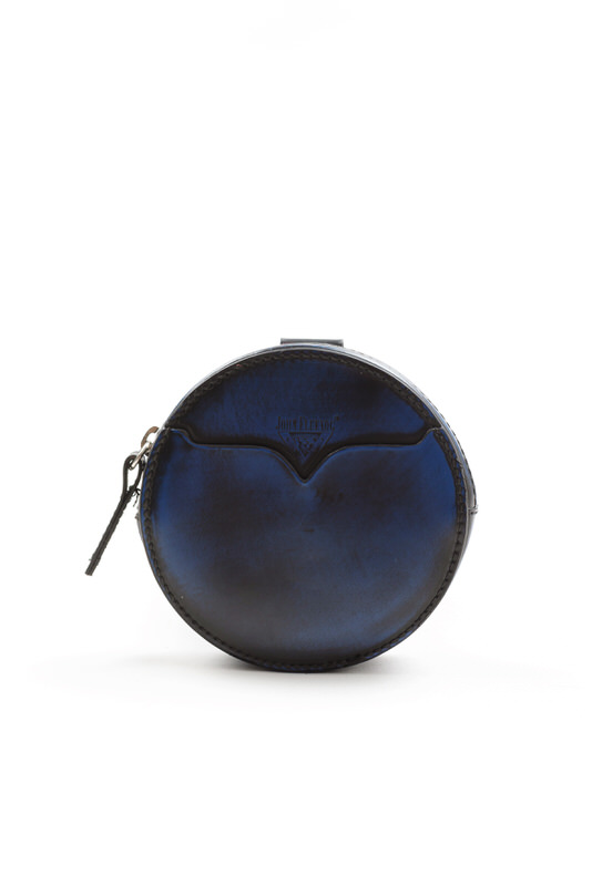 Vintage round john fluevog blue white background